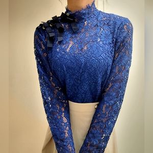 Blue J. Crew Blouse with black bows, size 0.